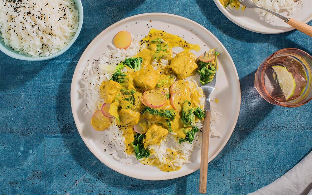 Coconut Turmeric Chicken Curry over nigella-scented basmati rice,